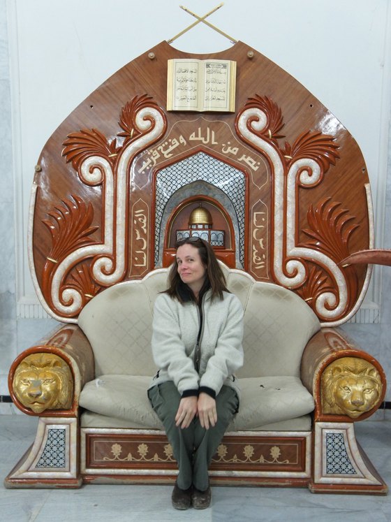 carolyn on saddams throne.jpg