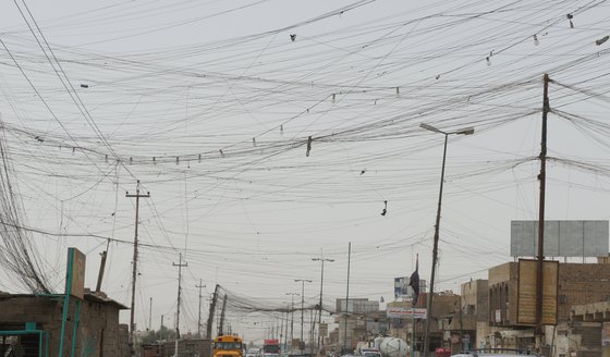 Overhead wires create complicated nests in Basra, Iraq.